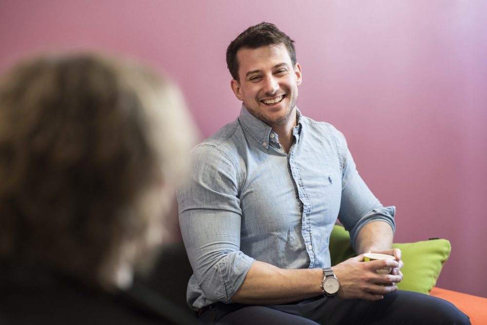 Man in meeting having conversation