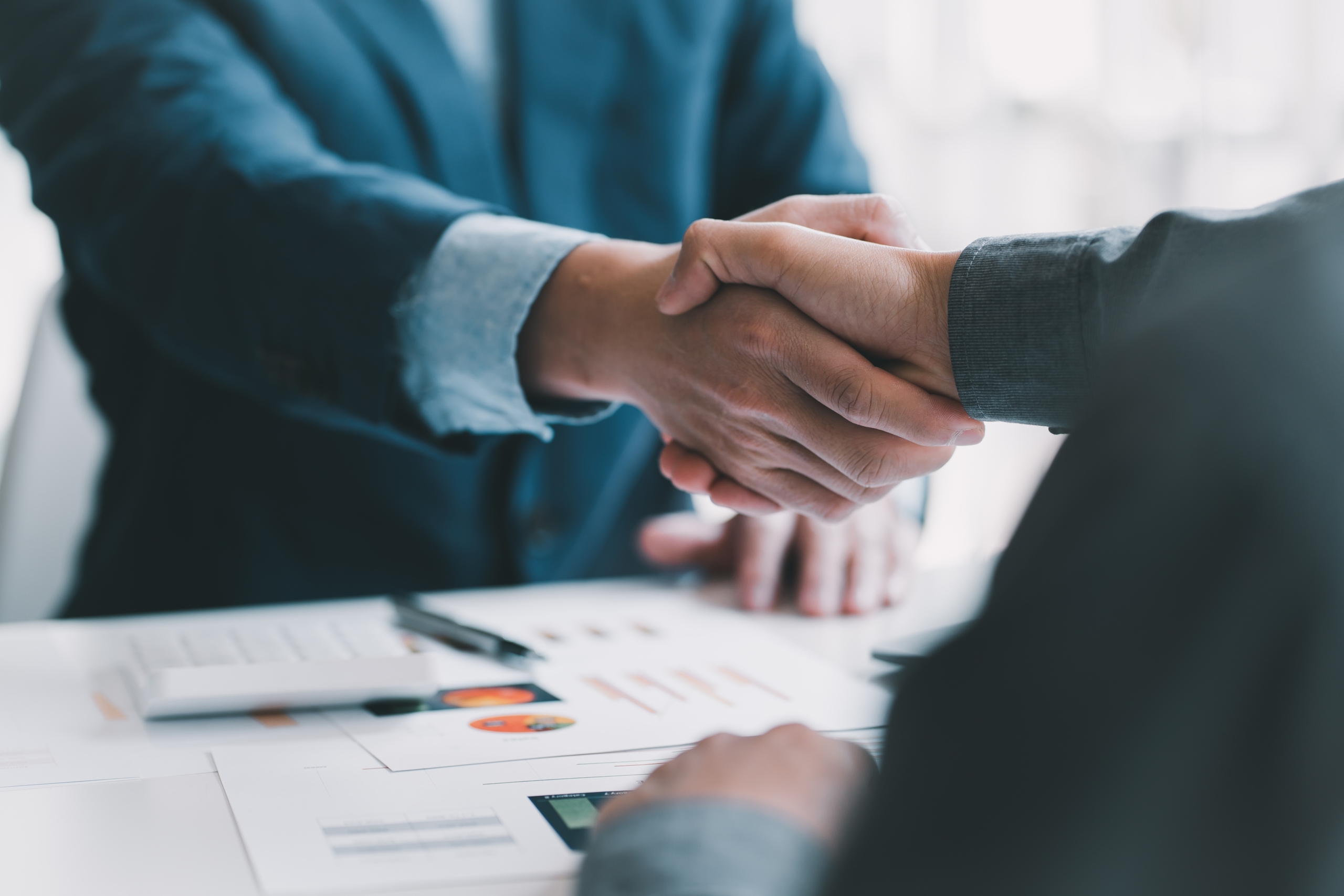 two people shaking hands