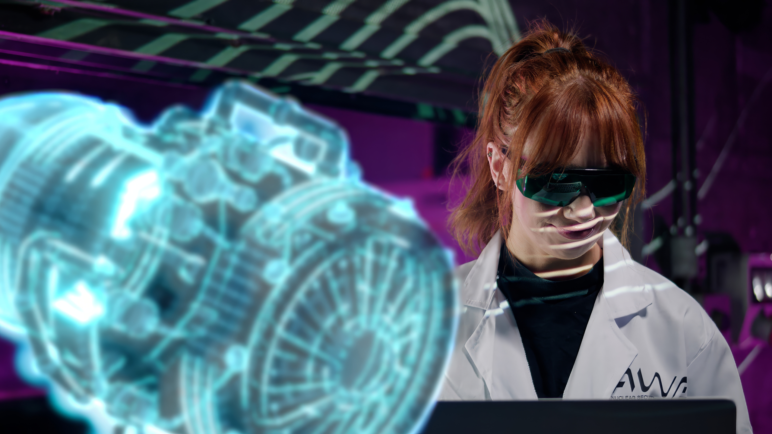 A woman in a white lab coat with the "AWE" logo sits at a computer, viewing a holographic projection of an engine.